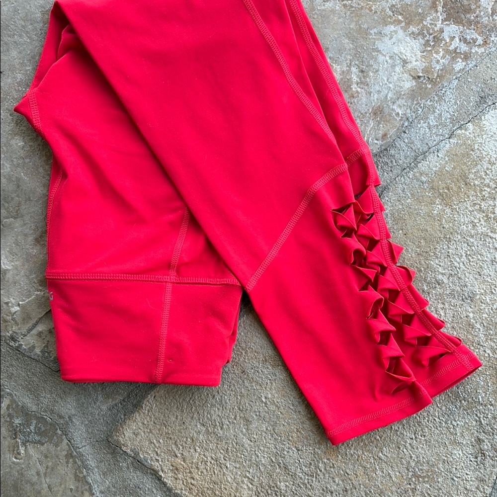 Vibrant Coral Leggings with Triangle Cutouts
